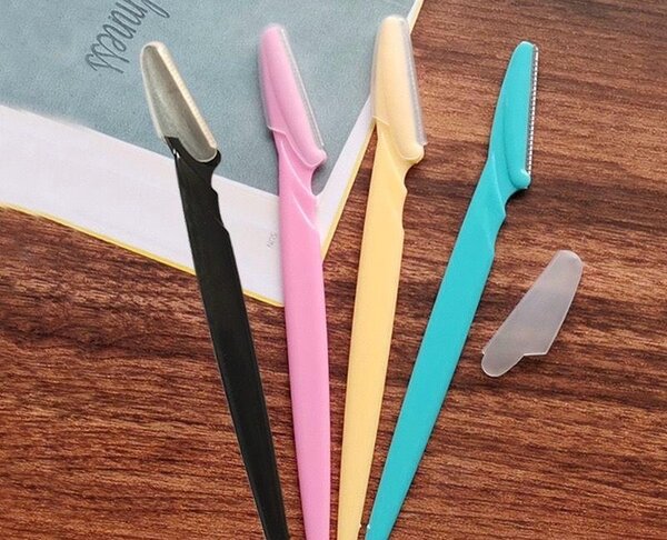 Facial razor blade