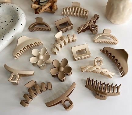 Claw clips,mannequin head and hair spiritz.