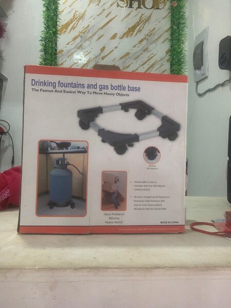 Base mobile pour bouteilles