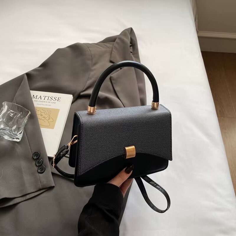 Sac à main élégant en cuir noir