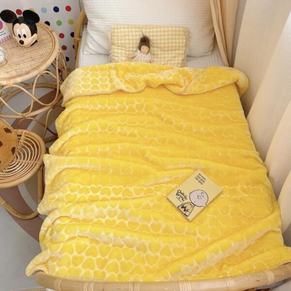 Yellow baby blanket with hearts