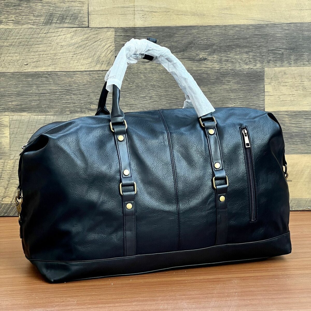 LEATHER DUFFLE BAGS