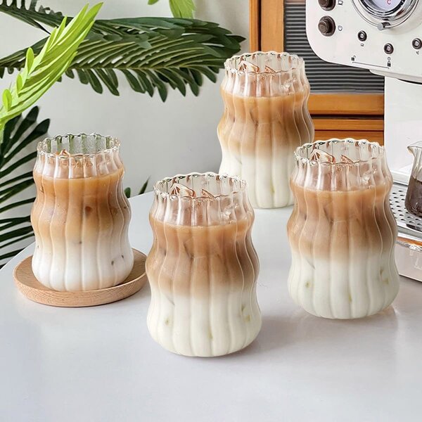 Wavy glass jar with glass straw