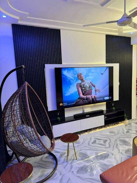 Tv unit with panels