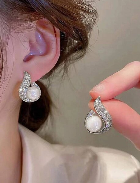 Luxurious Faux Pearl and Rhinestone.