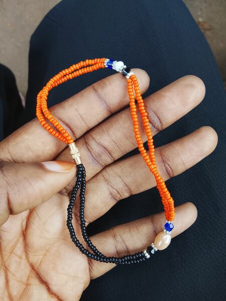 Perles au pied