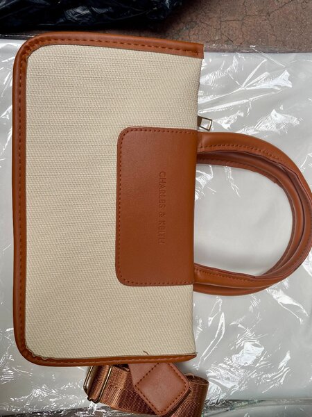 Sac élégant en cuir et toile