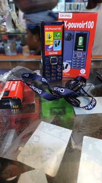 Téléphone portable OKING avec chargeur 10000mAh