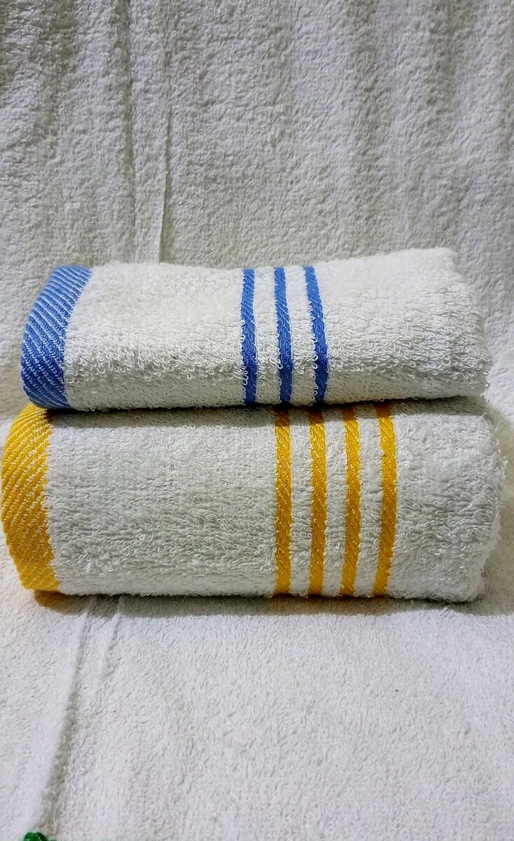 Serviettes de bain rayées luxe