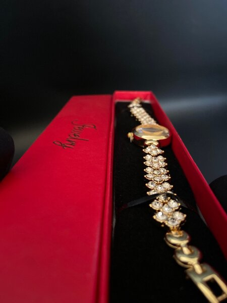 Gold tone watch