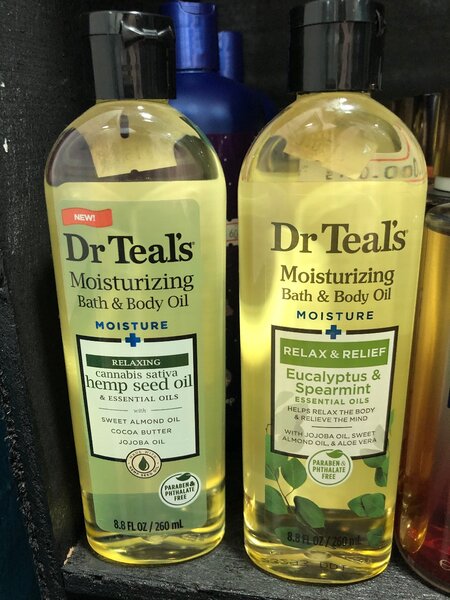 Teal body oil