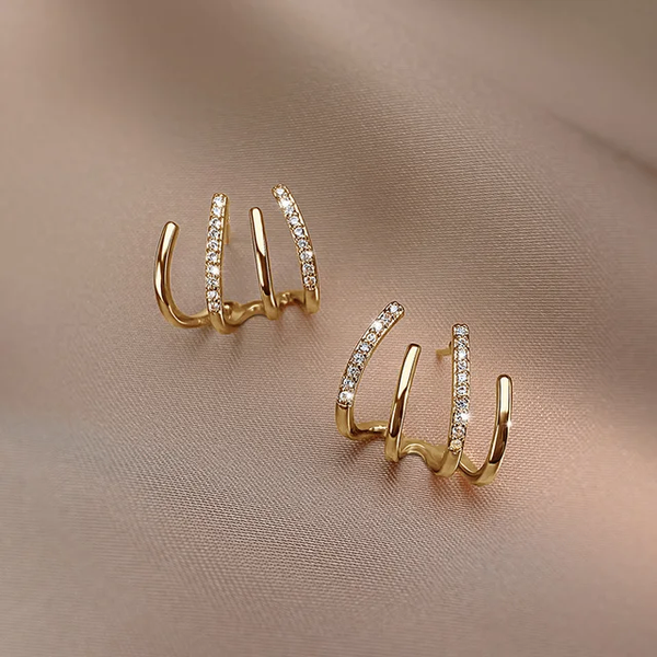 Boucle d'oreille en forme de triton