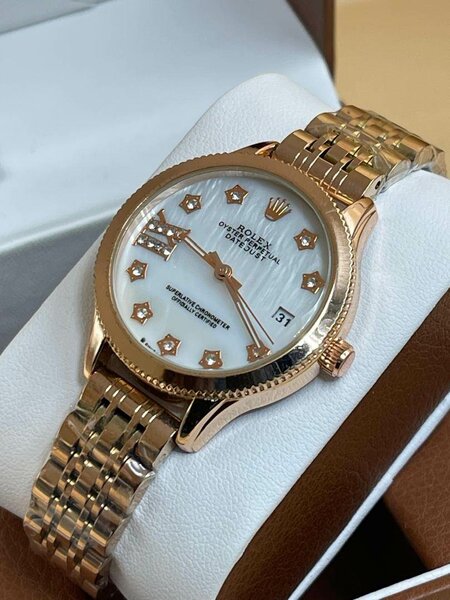 Montre  FEMME  ROLEX / CARTIER