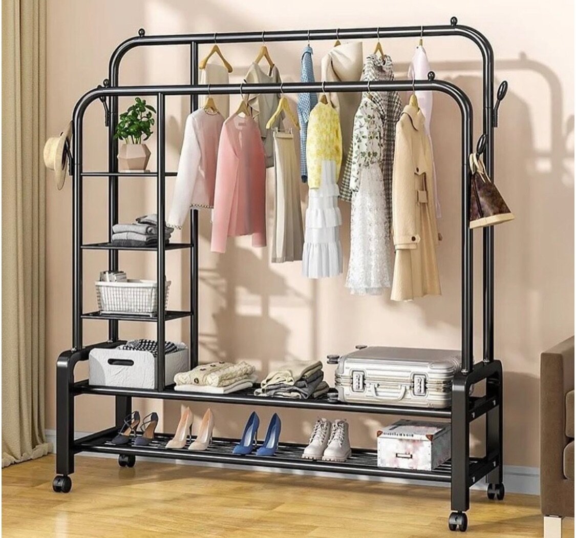 Foldable clothes hanging rack