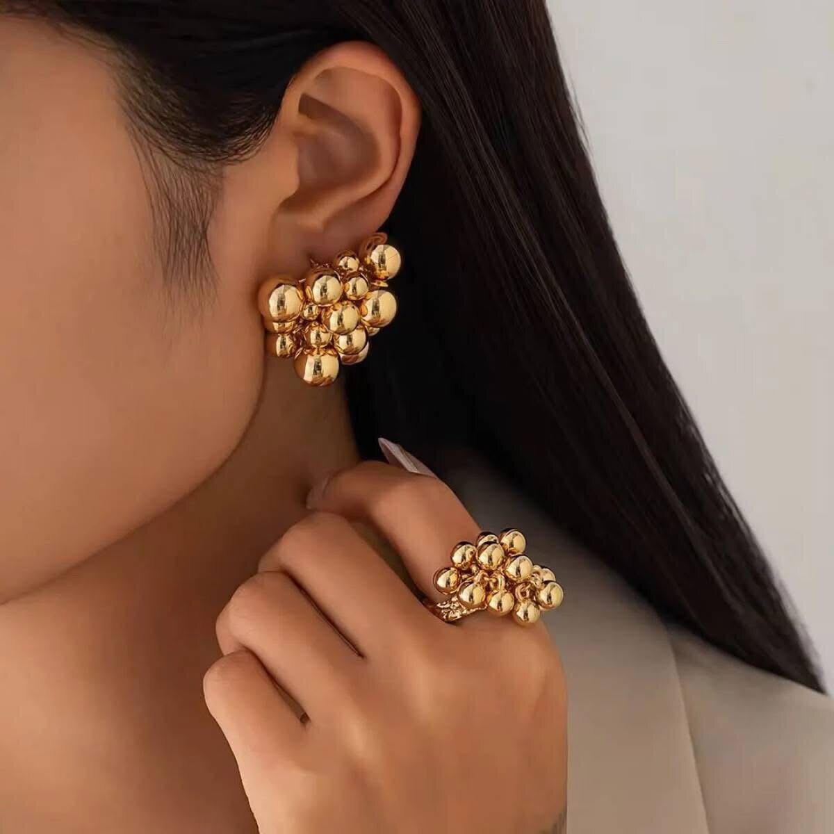 Boucles d'oreilles dorées tendance