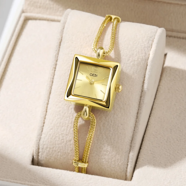Montre femme dorée élégante