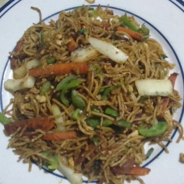 Vegetable spaghetti with egg and  sausage