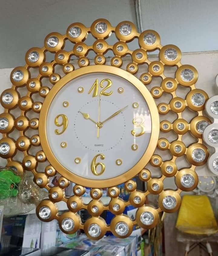 Horloge murale or