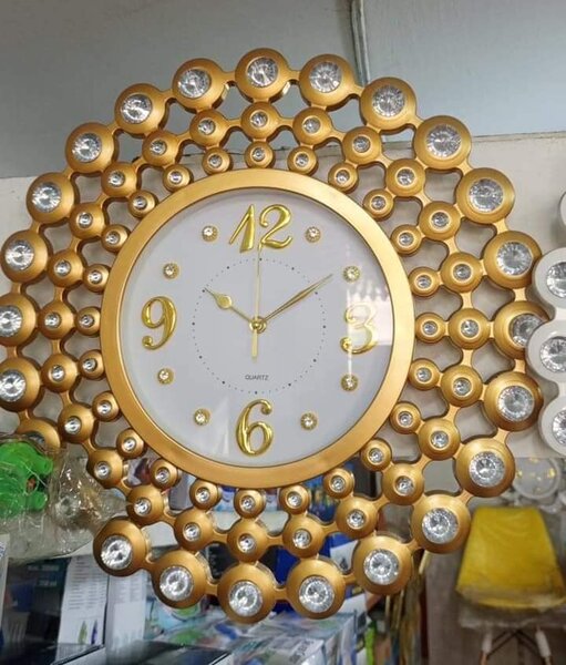 Horloge murale or