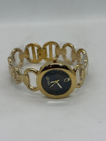 Montre femme élégante dorée