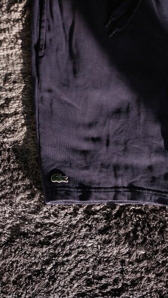 Blue Lacoste shorts