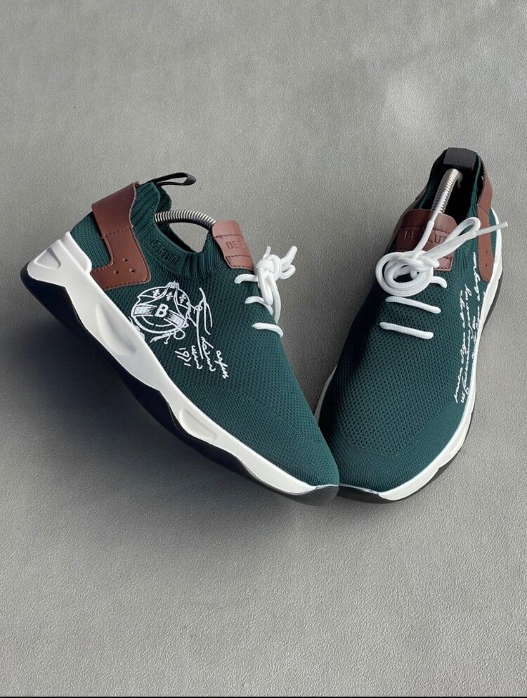 Berluti avec son carton