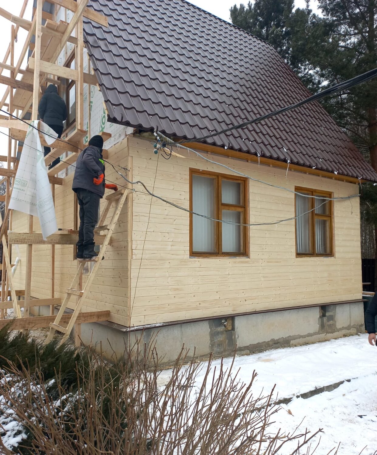 Обшивка дома, имитирующая брус.