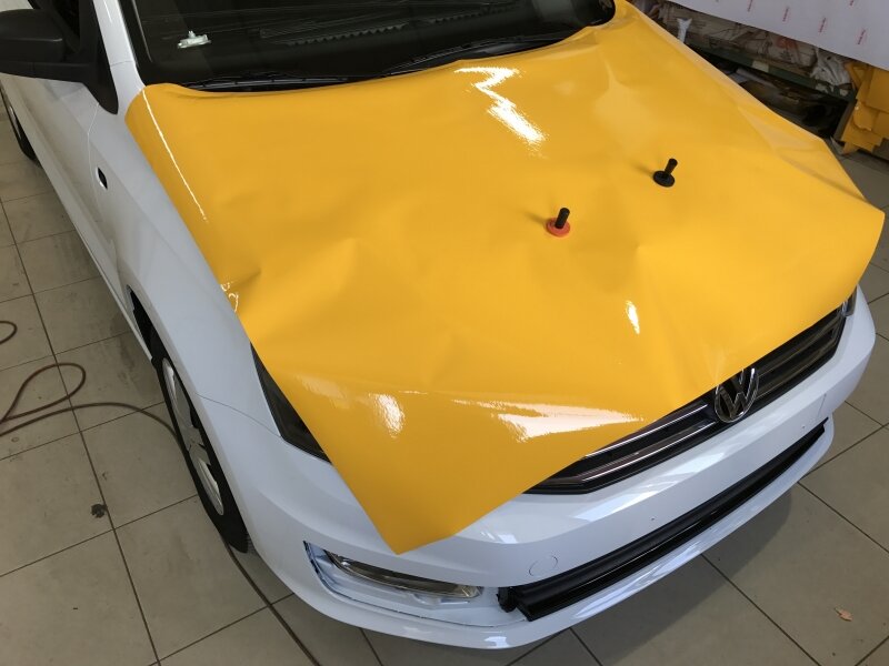 Оклейка автомобиля пленкой для такси