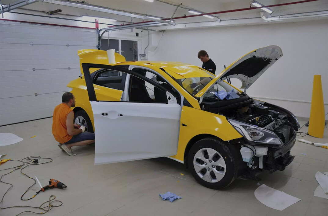 Оклейка автомобиля пленкой для такси