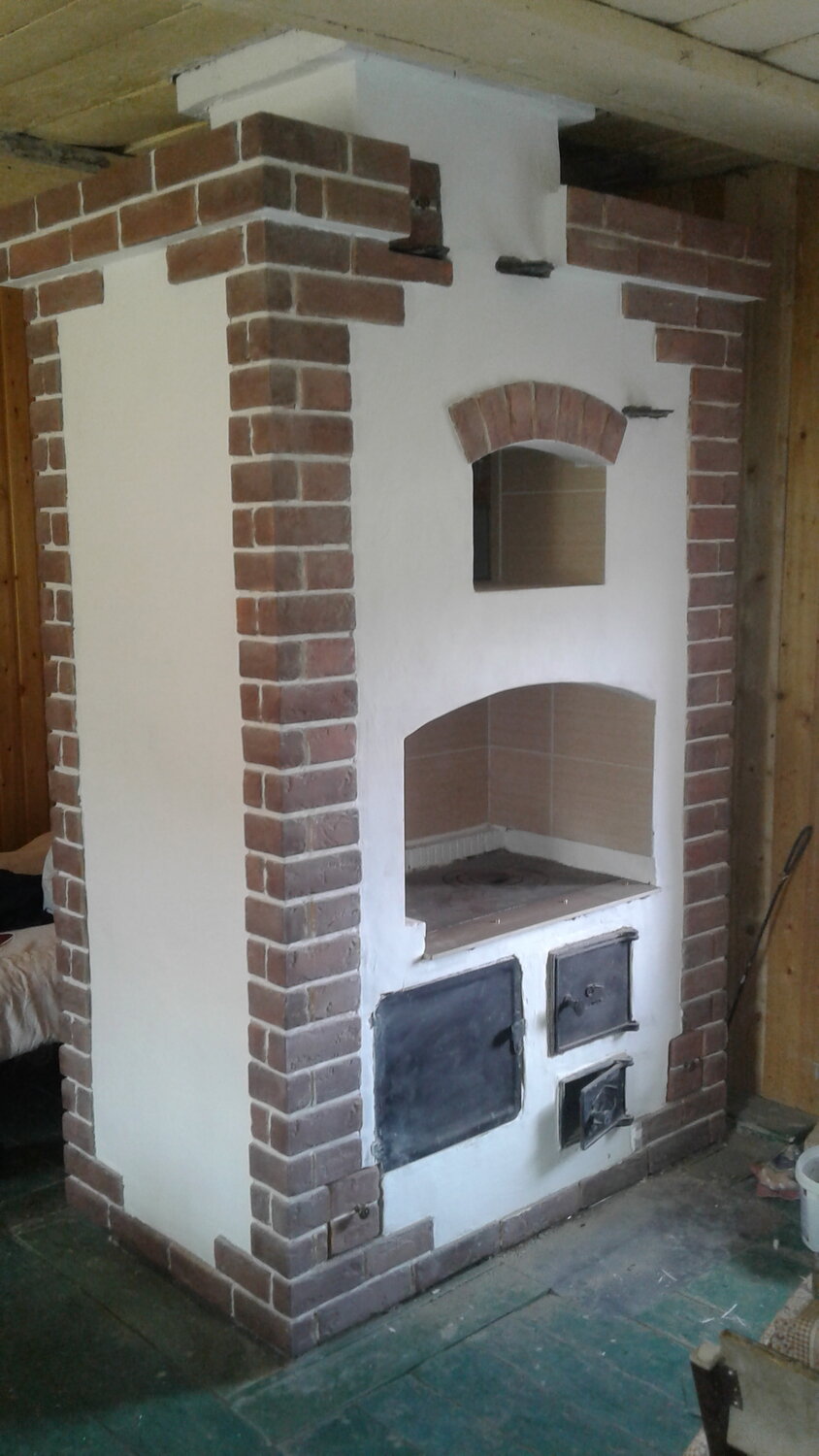 отделка печей, отделка русской печки в доме, отделка русской печки, печь с подтопком и плитой, изготовление каминов и печей