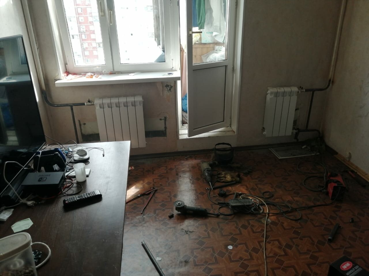 Монтаж батарей отопления