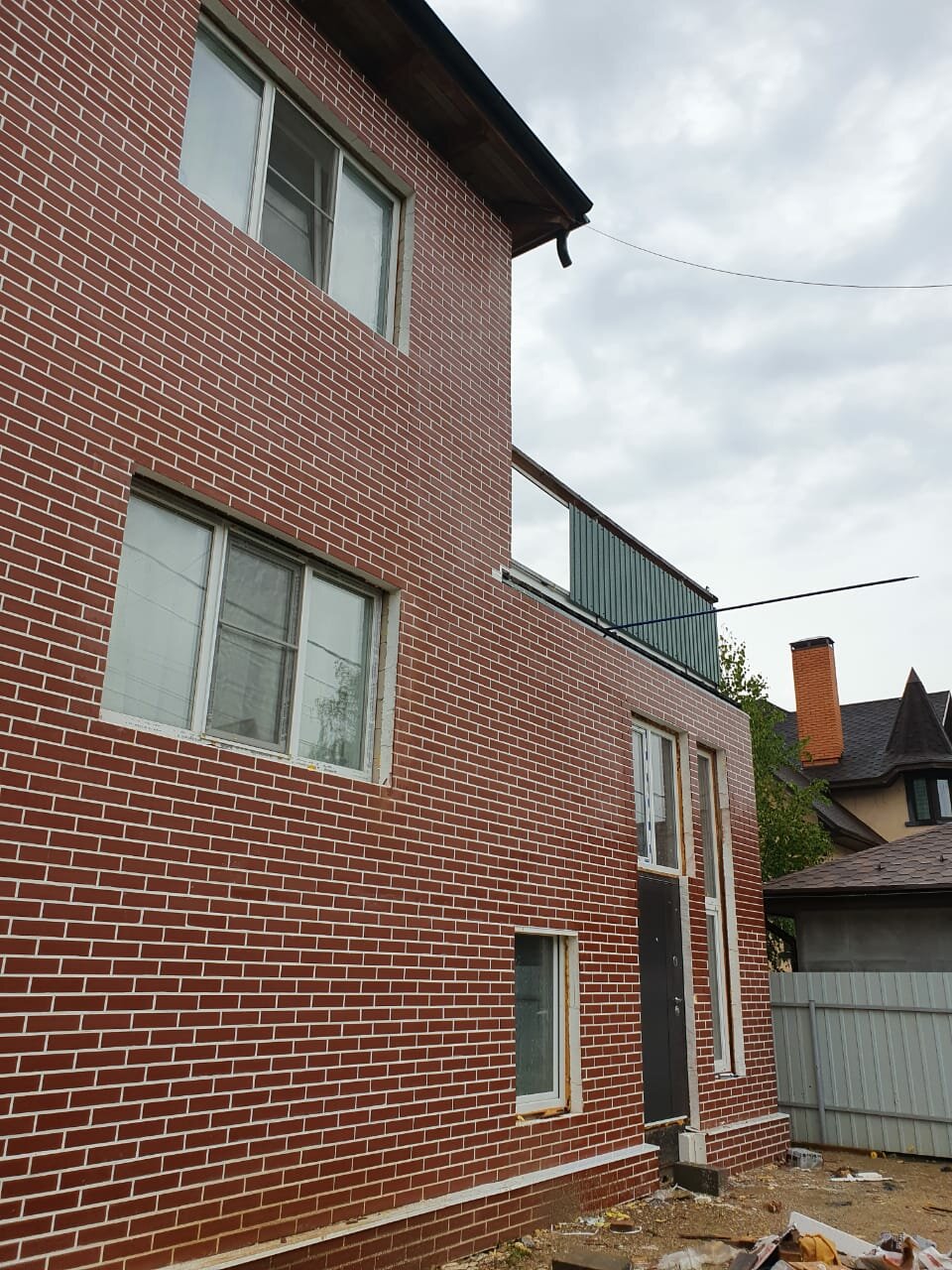 Монтаж фасада из металлического сайдинга