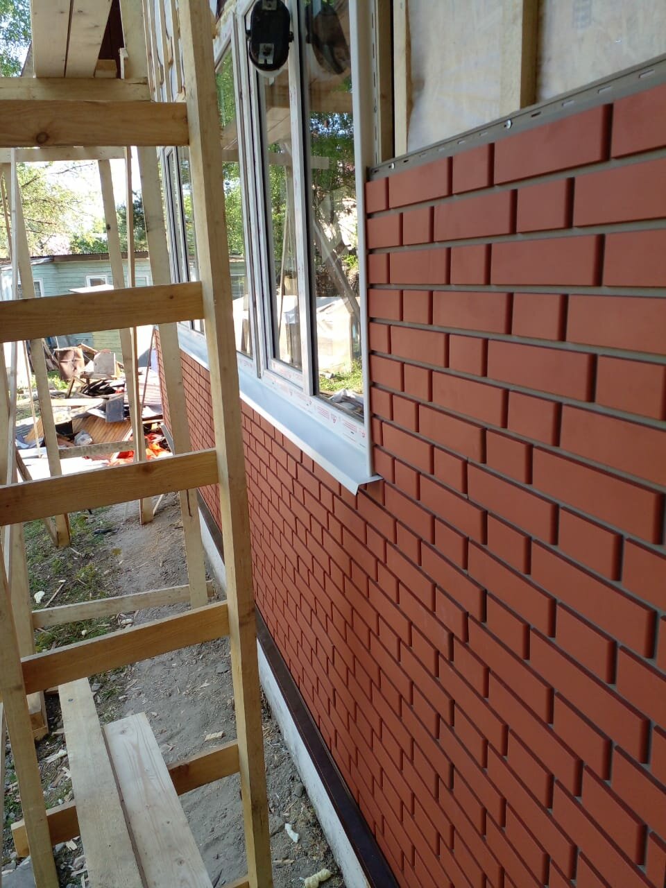 Установка фасадных панелей.