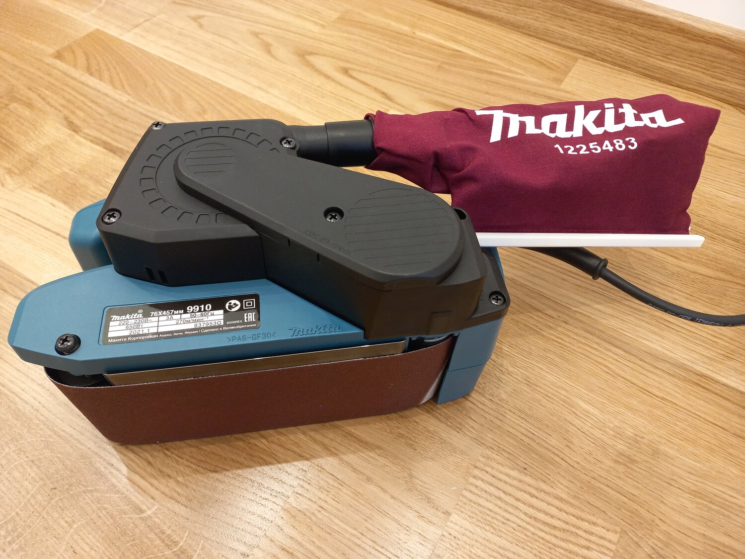 ленточная шлифмашина makita, шлифмашина makita 9910, makita 9910, ленточная шлифмашина makita 9910, машинка шлифовальная ленточная makita 9910