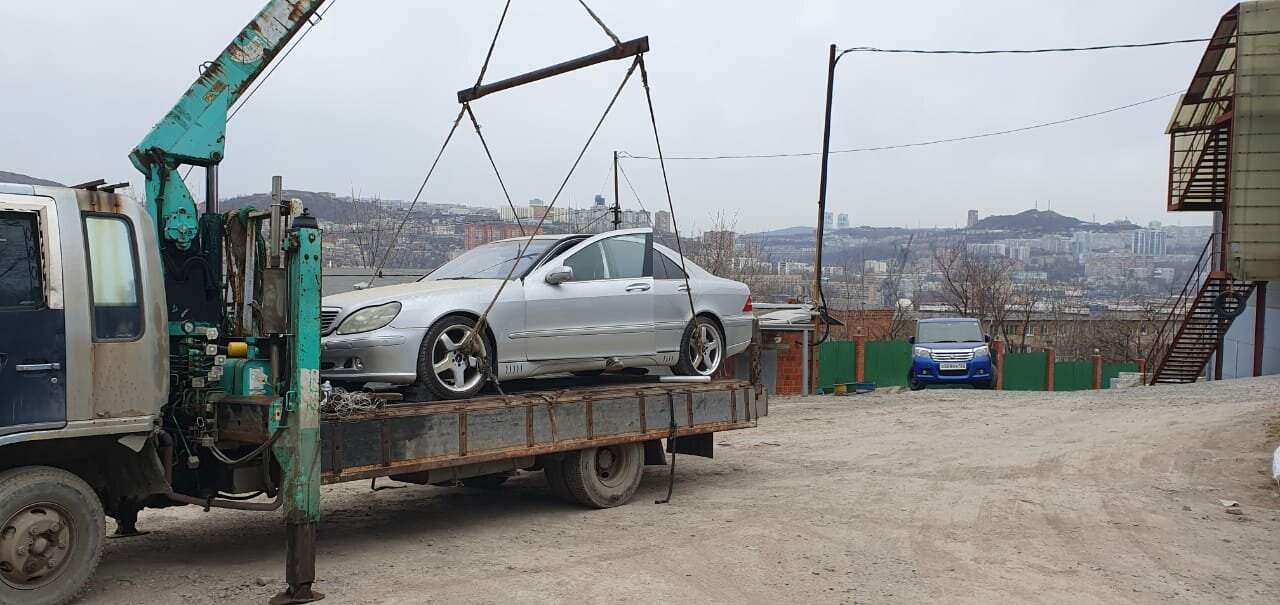 автомобиль, эвакуатор, ооо макларен, услуги эвакуатора, белый мерседес