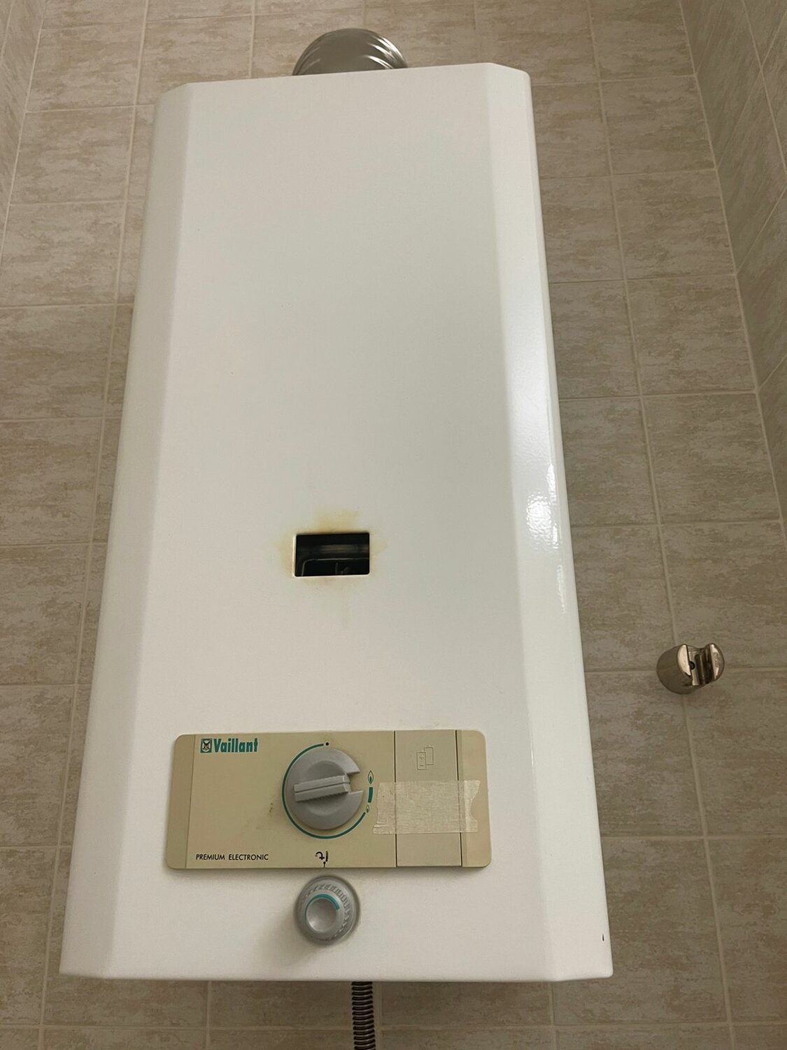 газовая колонка vaillant, газовая колонка, газовая колонка vaillant стрелка поднялась, vaillant газовый котел, газовая колонка вайлант