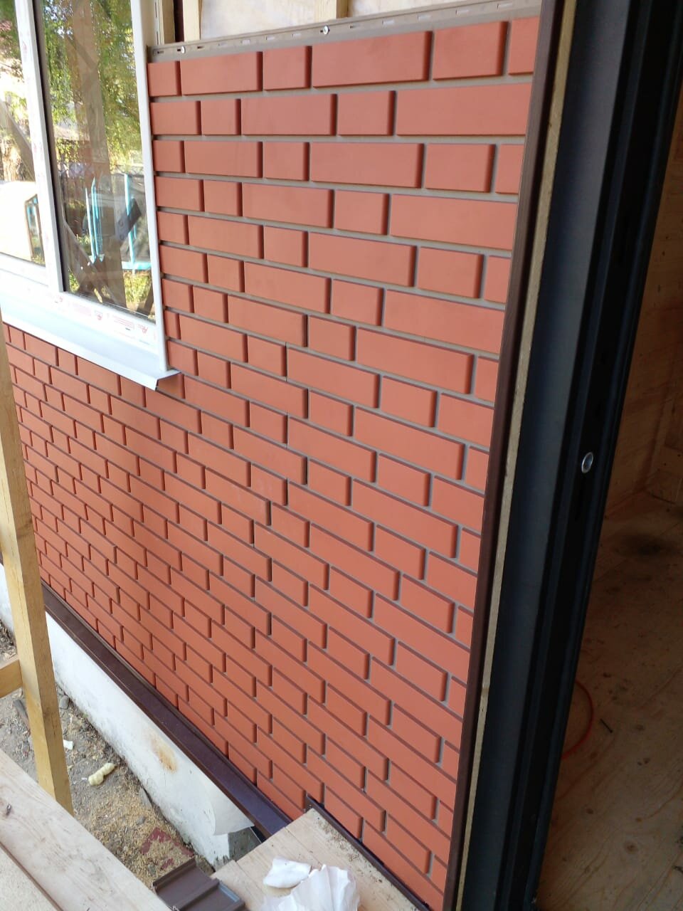 Установка фасадных панелей.