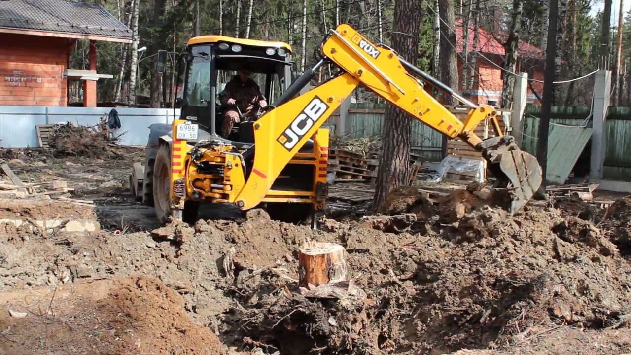 корчевание пней экскаватором погрузчиком, корчевание пней jcb, корчевание пней экскаватором катерпиллер., фс 19 техника для выкорчевывания пней, корчевание пней трактором