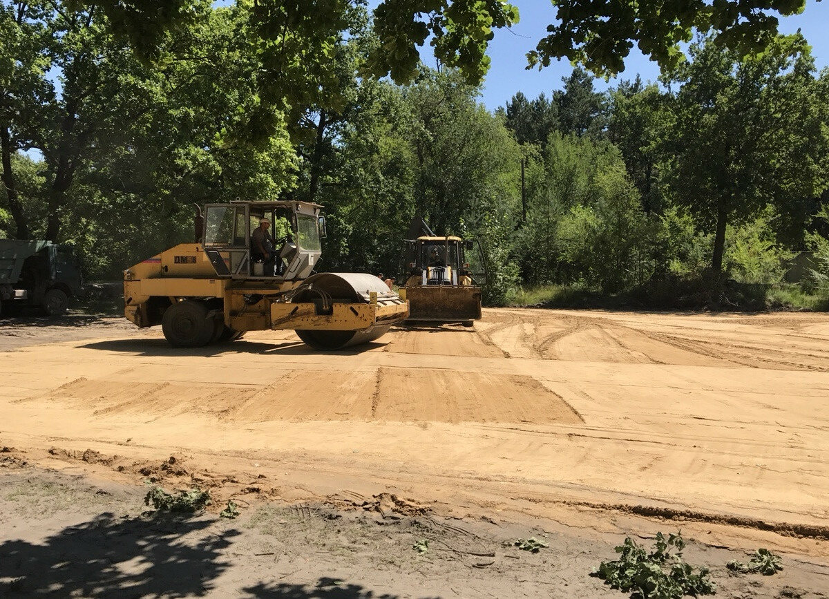 Устройство дорожного покрытия из песчаного асфальтобетона